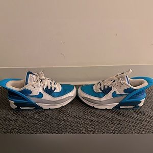 Nike Air Max with blue shield on back. Very lightly worn.